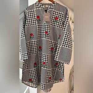 Pakistani two piece embroidered kurta and printed trouser.